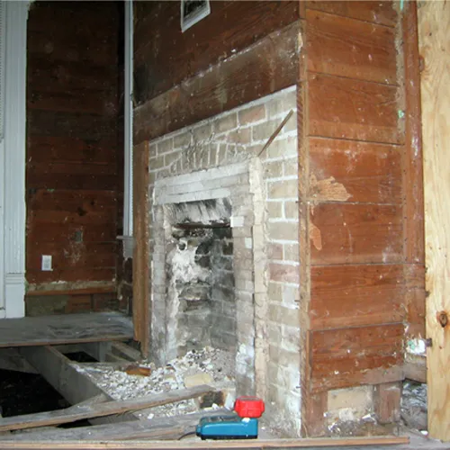 Interior fireplace before restoration