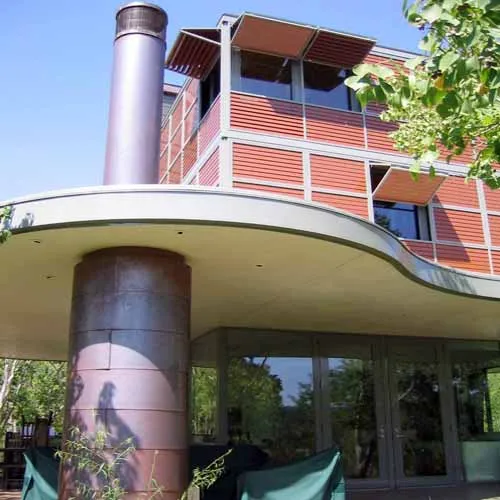Exterior Fireplace With Louvers Above
