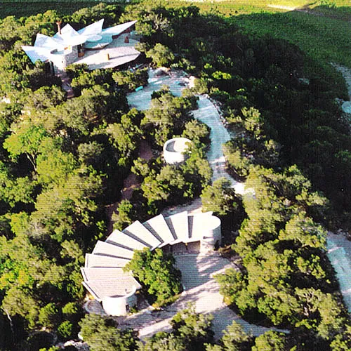Aerial View (From Bottom): Caretaker Apartment, Water Storage Building, Main Lodge, Pedernales River