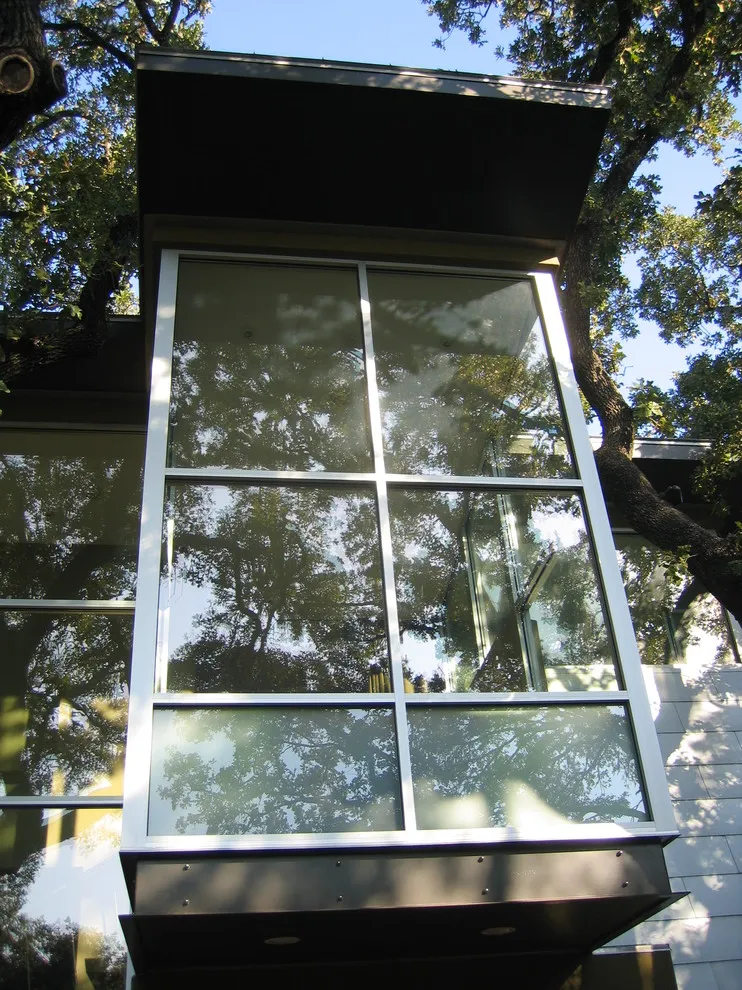 Exterior View Of Cantilevered Stair Landing.
